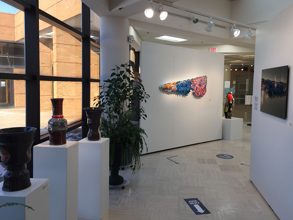 Installation view from windows featuring Clark, Mosher, Canale, Carpenterr
